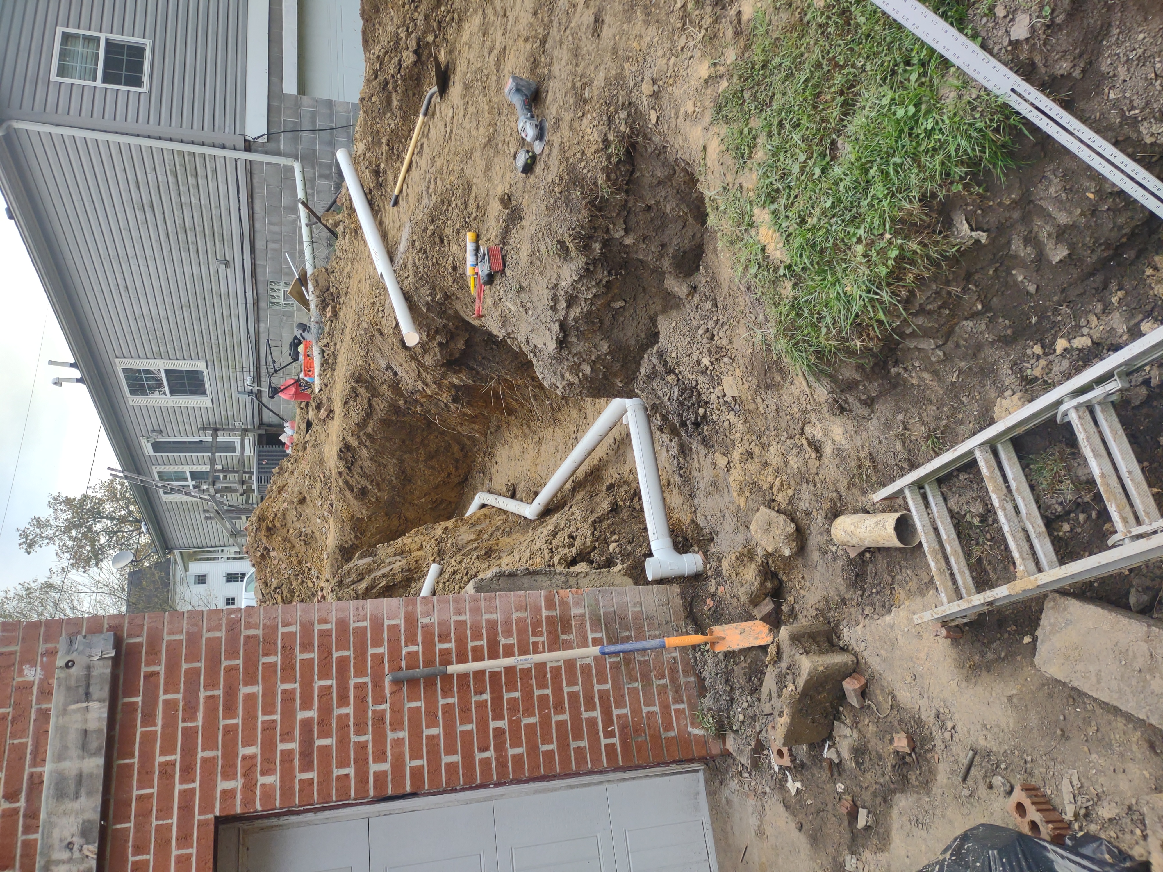 French drain pipe laid in trench