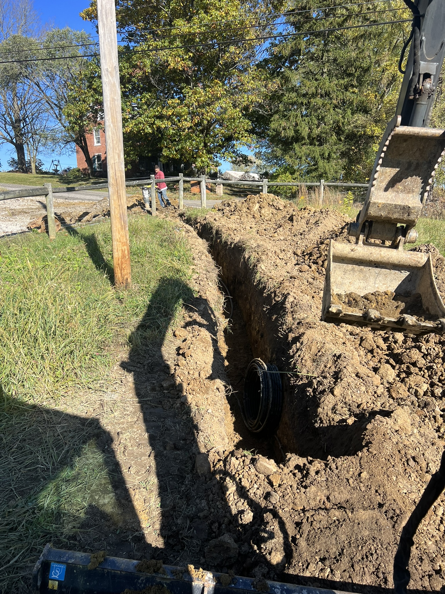 Conduit trench with HDPE pull rope along road