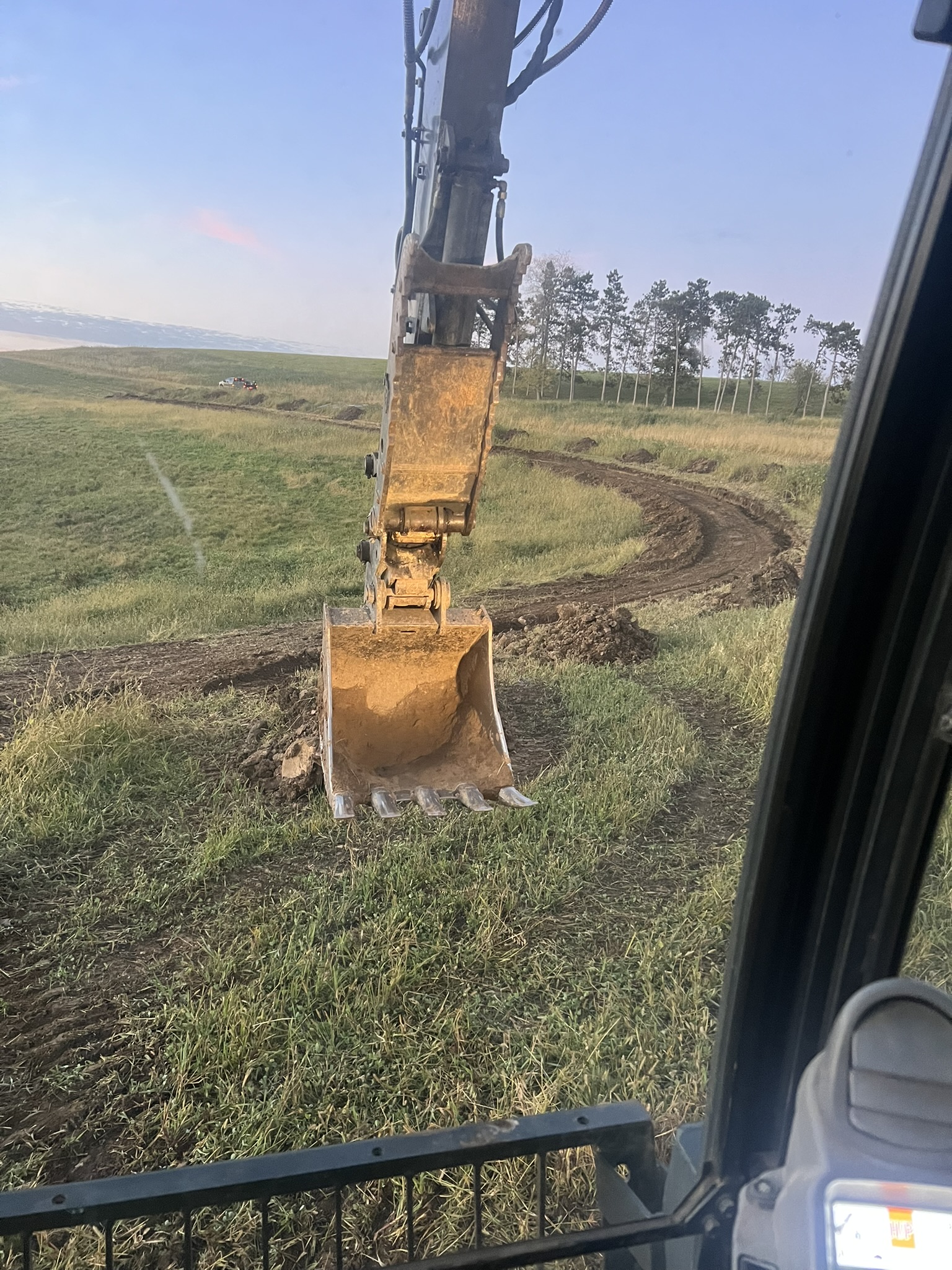 Early morning cab view of curved trench route