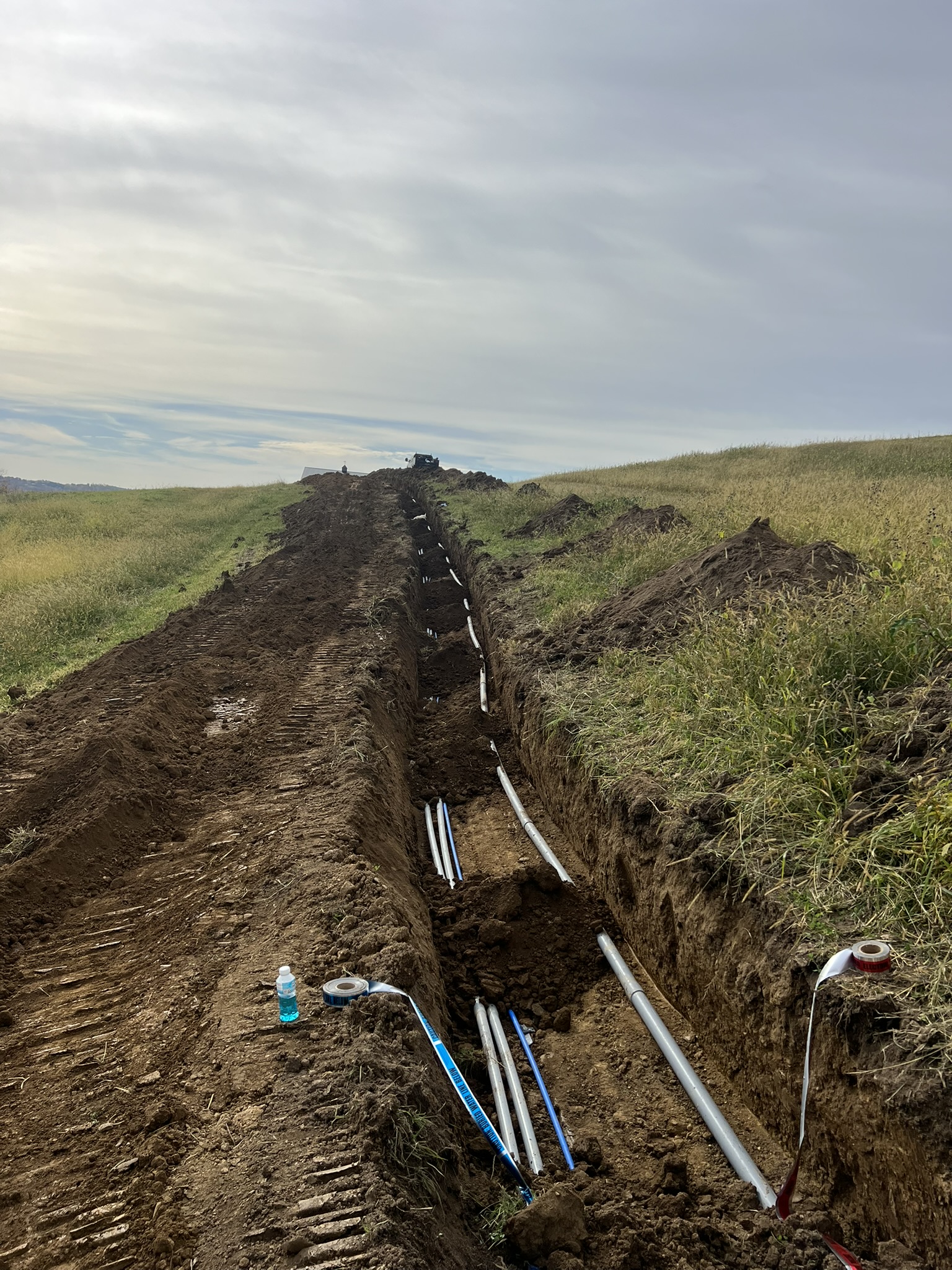 Long trench with multiple utility lines installed